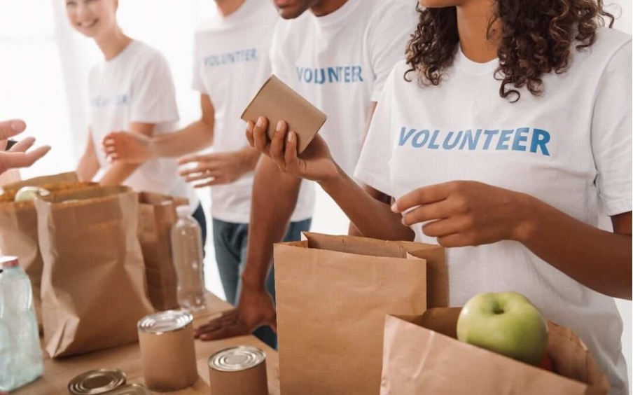 Volunteers packing food for community distribution